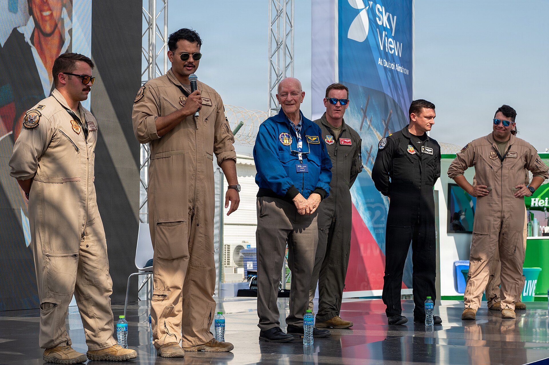 A U.S. Air Force pilot speaks to students during the Meet a Pilot event at the Dubai Airshow 2025 at Al Maktoum International Airport in Dubai, United Arab Emirates, Nov. 18, 2025.