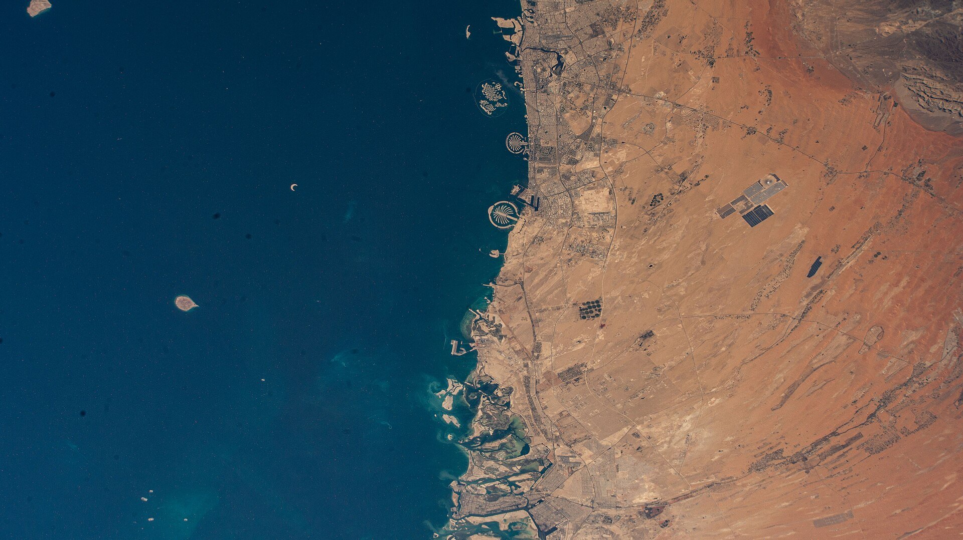 iss073e0003324 (April 30, 2025) --- (From top to bottom) The United Arab Emirates' two most populous cities of Dubai and Abu Dhabi with a combined population of nearly 5.8 million,