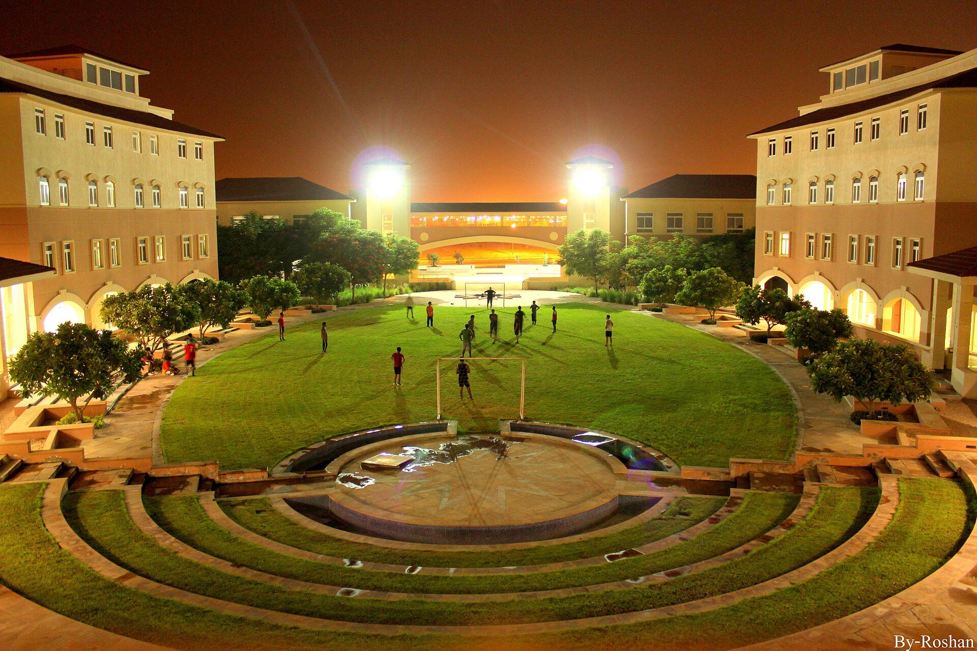 Its a night view of institute's campus, students are playing football. This photograph of IMT Dubai Campus was clicked by Roshan Jain (Class of 2015), more of his works can be seen