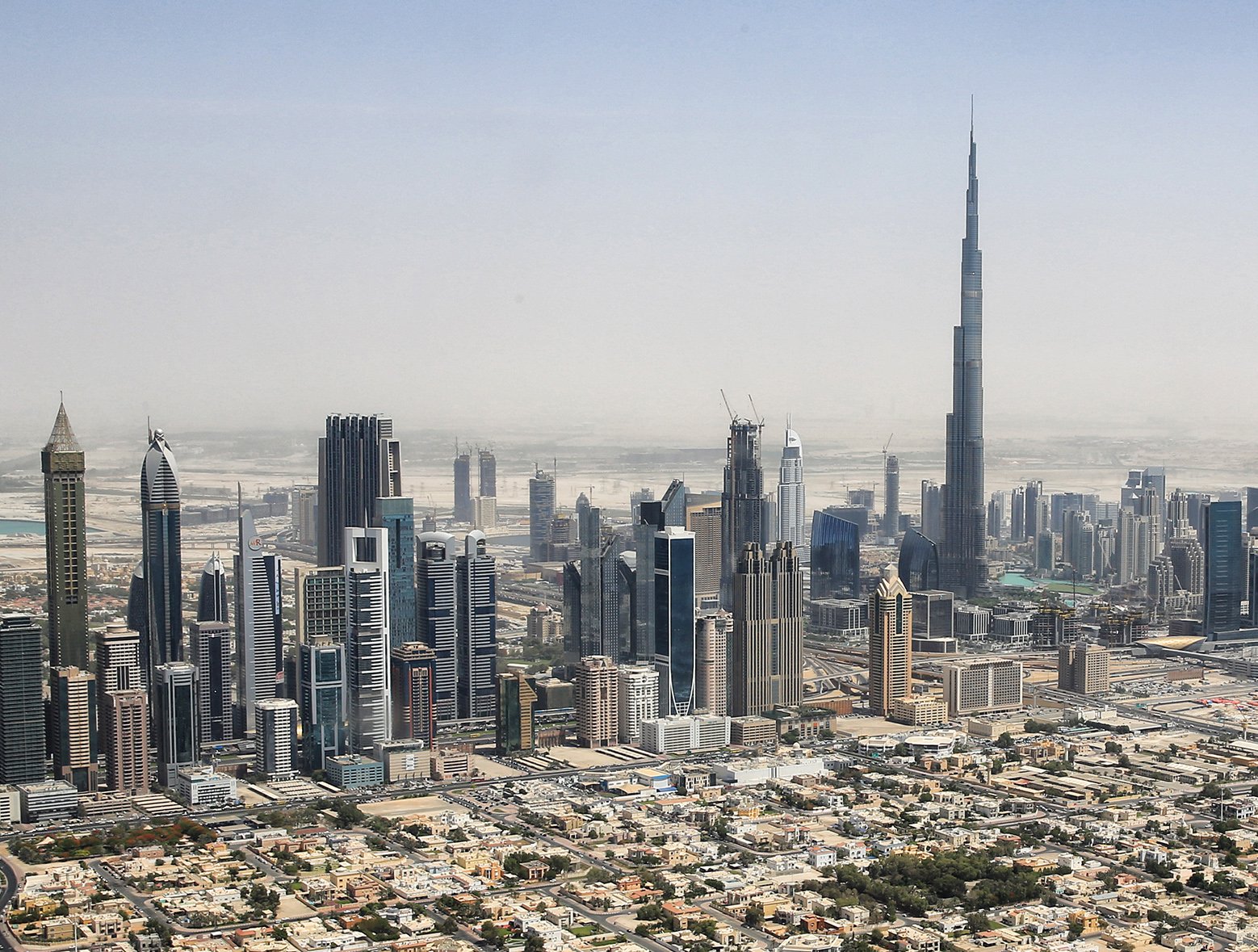 Skyline of Downtown Dubai with Burj Khalifa from a Helicopter (crop of File:Dubai skyline 2015.jpg)