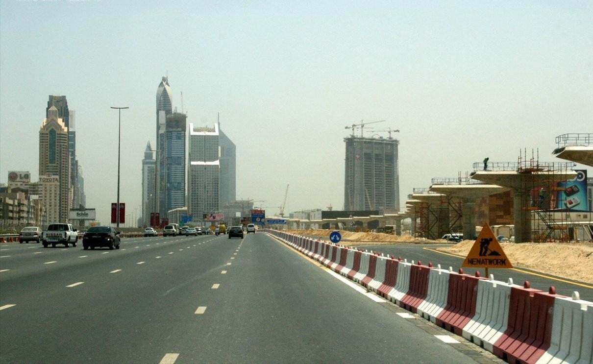 This is a photo showing Sheikh Zayed Road and its skyscrapers in Dubai, United Arab Emirates on 14 July 2007. The camera is looking north-northwest toward Deira. Construction of