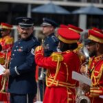 U.S. Air Force Airmen assigned to the 9th Air Force (Air Forces Central) Band and United Arab Emirates Armed Forces Band members prepare for a performance on the opening day of the
