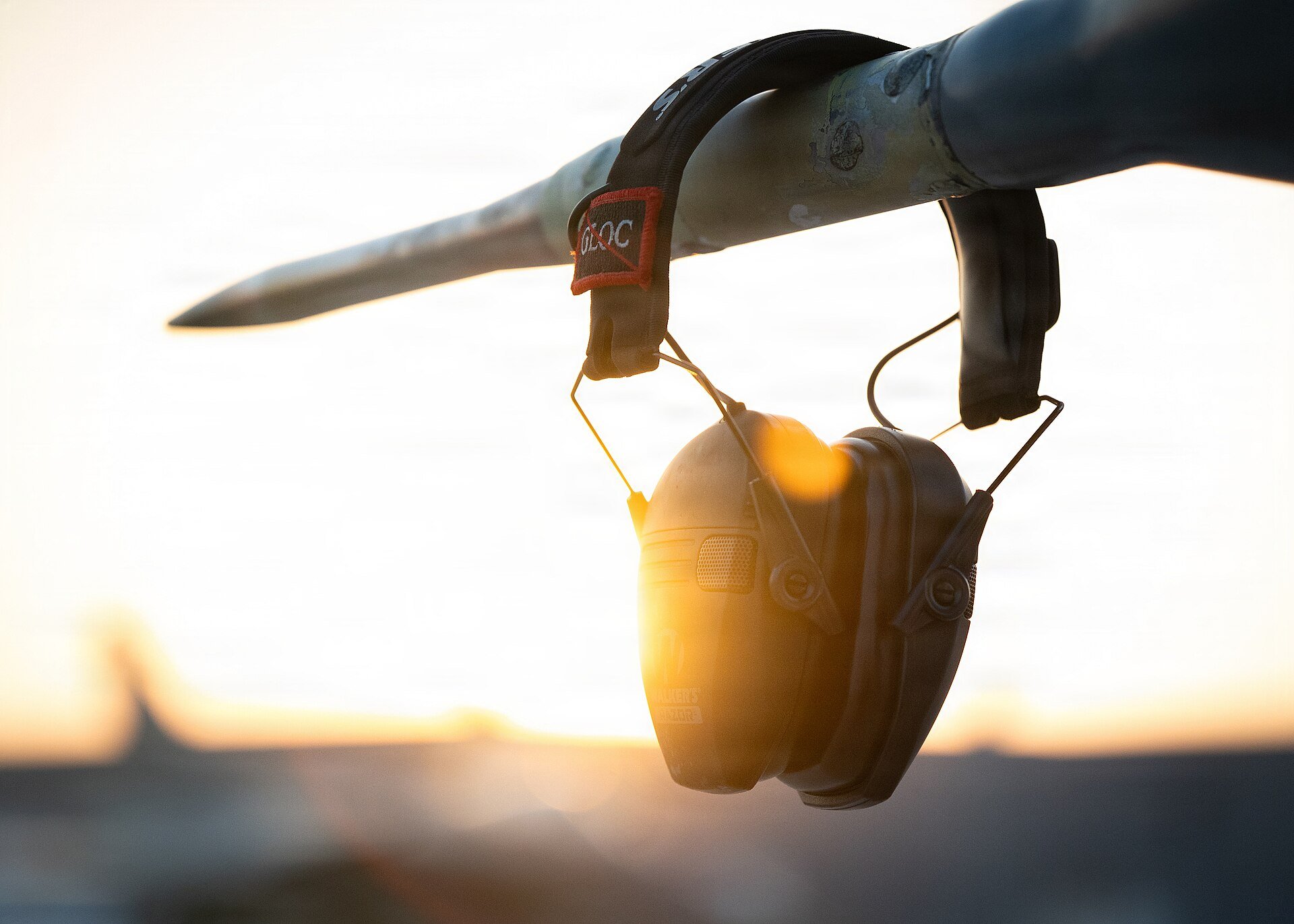 A crew chief’s hearing protection is prepared for use during an airshow at Dubai, United Arab Emirates, Nov. 13, 2025. The team performs at more than 20 air shows each year, travel