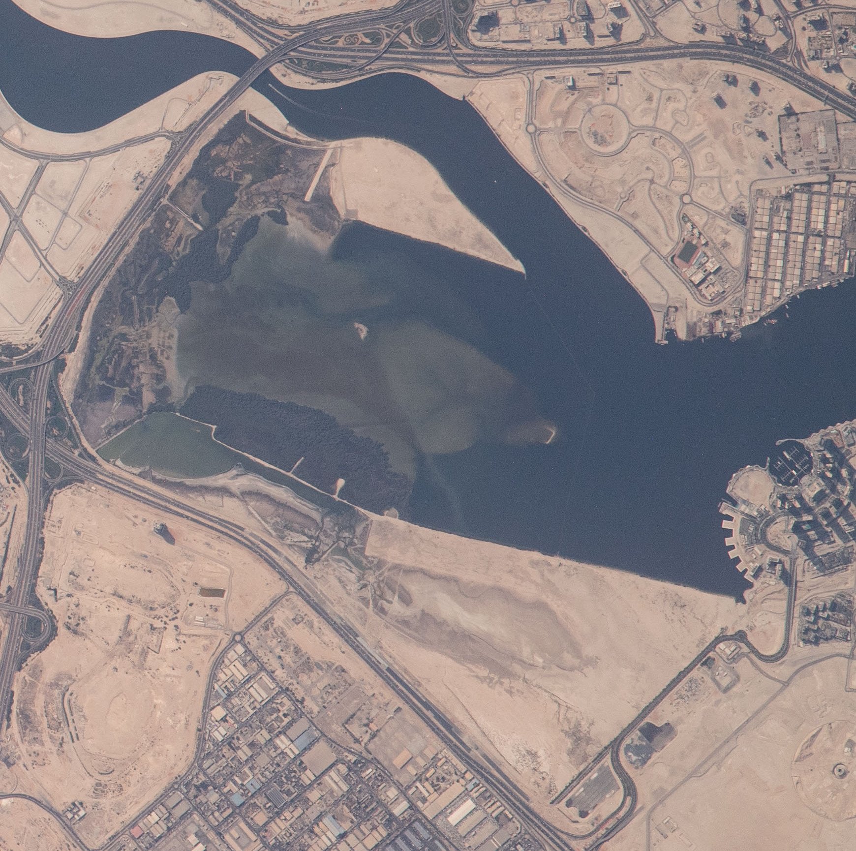 View of Dubai taken during ISS Expedition 65. Ras Al Khor wetlands (Wildlife Sanctuary and public parks), Bukadra construction site, Dubai Canal, upper Dubai Creek, Al Jadaf constr