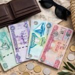 UAE dirham banknotes and a wallet