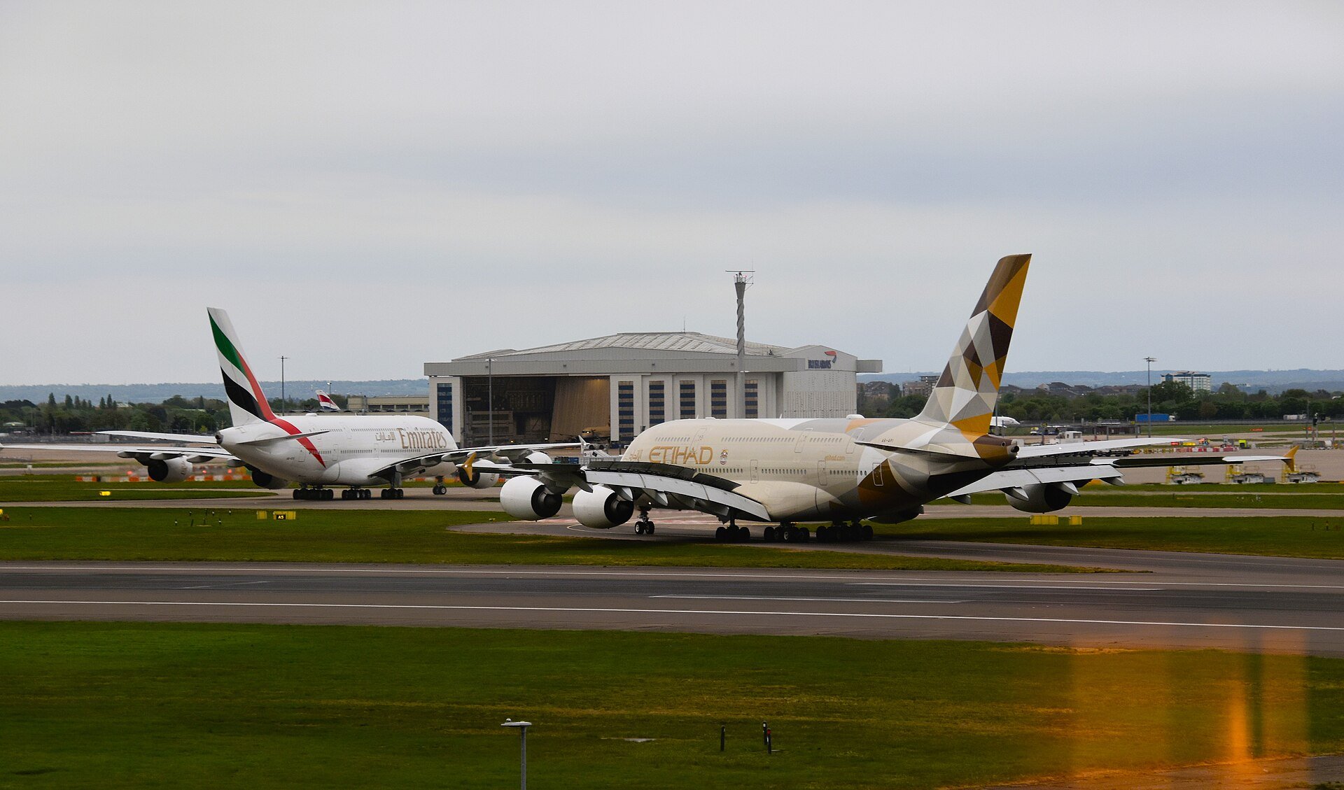 Etihad flight EY 67, operated by Airbus A380 A6-API, arriving from Abu Dhabi, and Emirates flight EK 3, operated by Airbus A380 A6-EOI, arriving from Dubai.