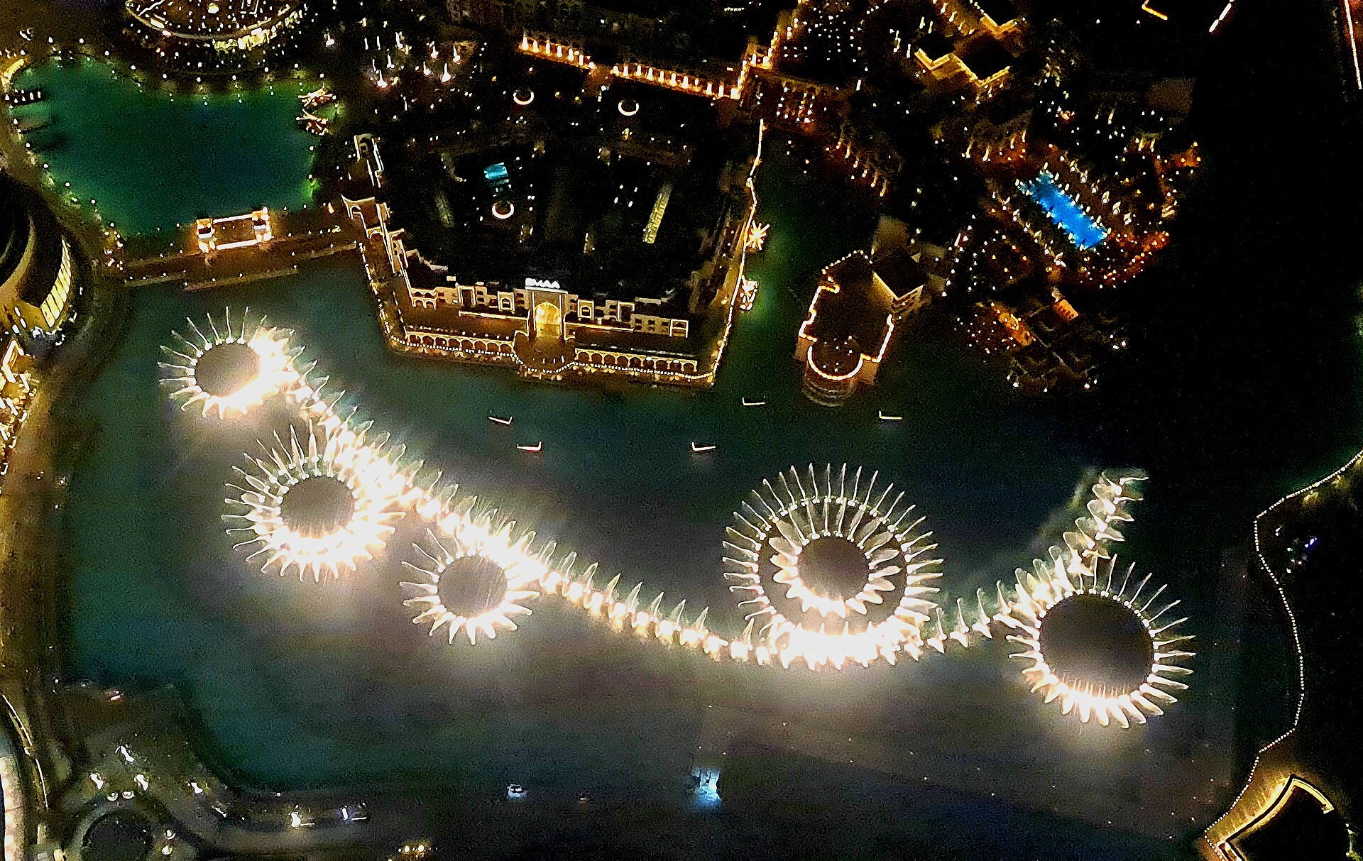 This picture was taken from the top of Burj Khalifa. View of the Dubai fountain show.